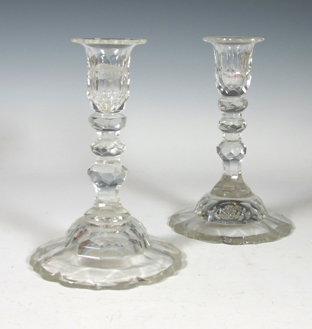A set of four 19th century cut glass candlesticks