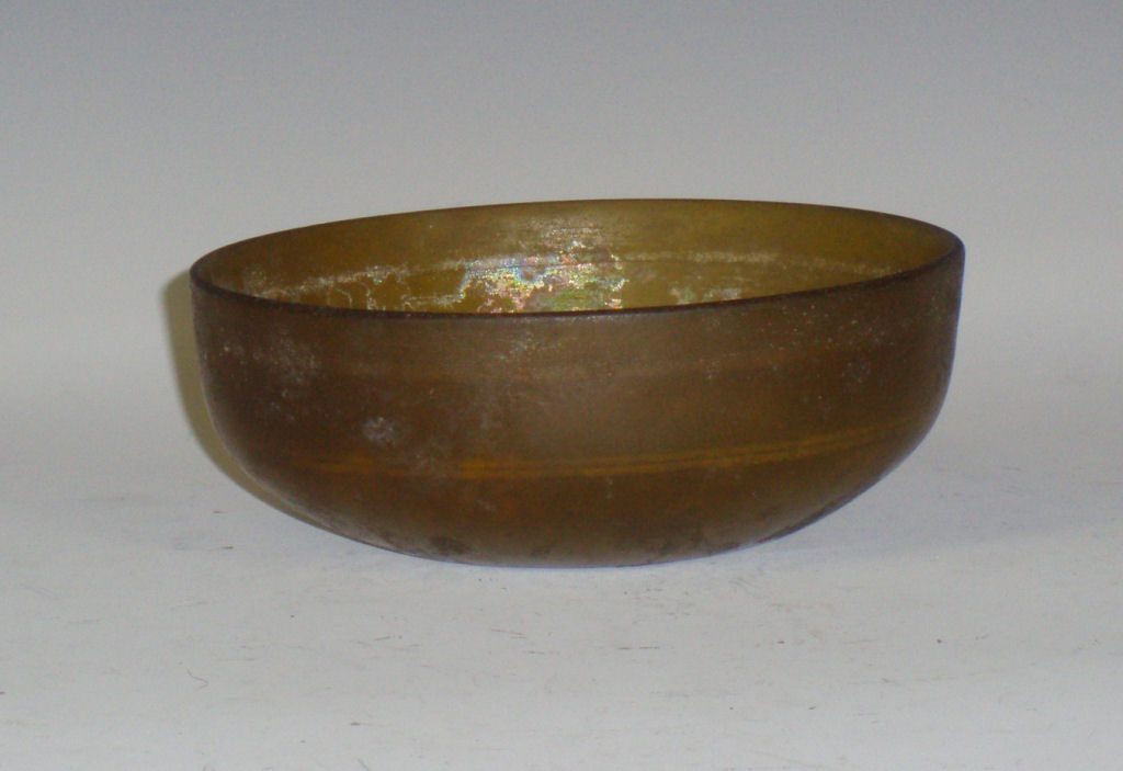 A Roman linear-cut glass bowl, Eastern Mediterranean, circa 300-400 B.C.