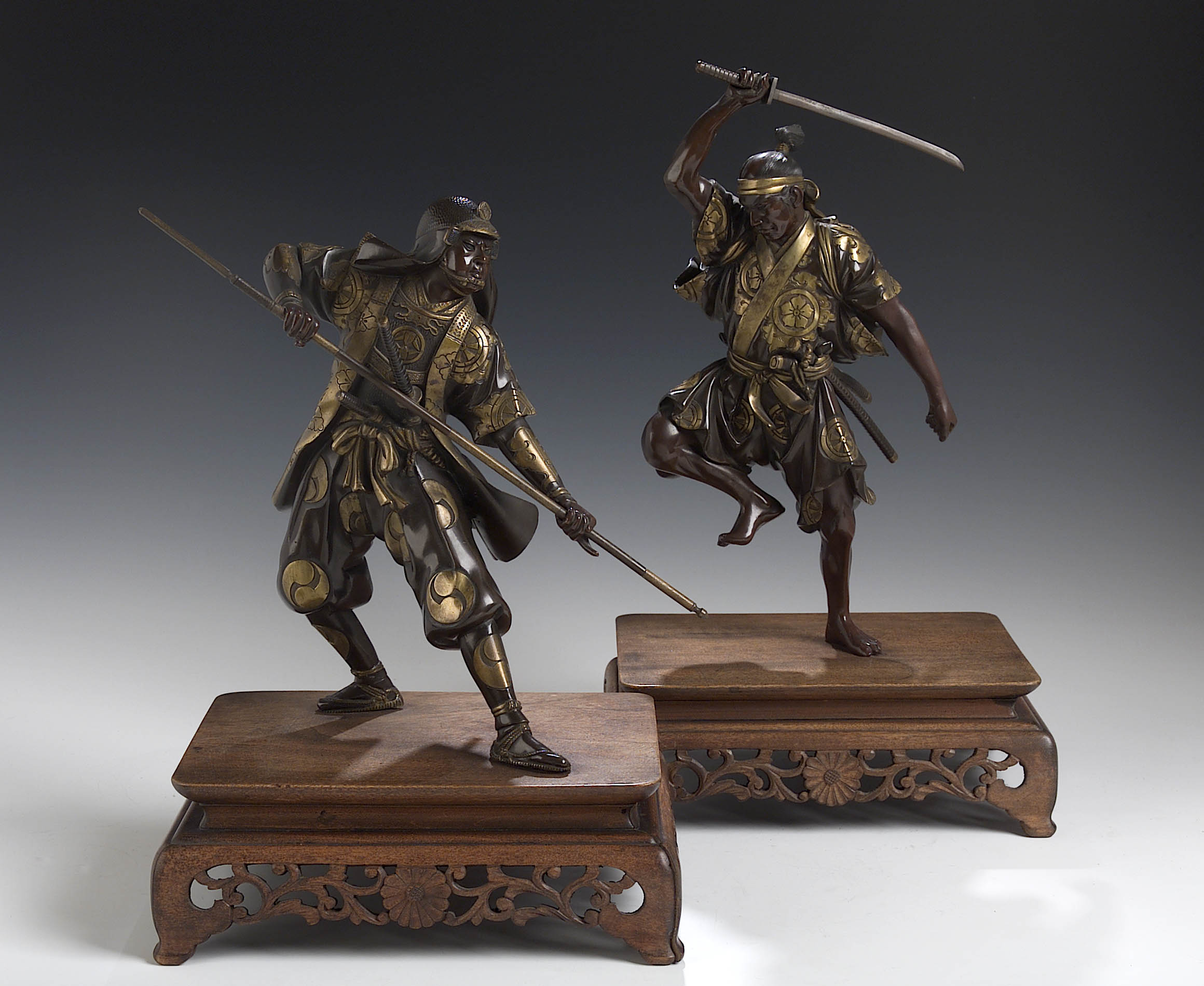 A pair of Japanese bronze Miyao style Samurai warriors