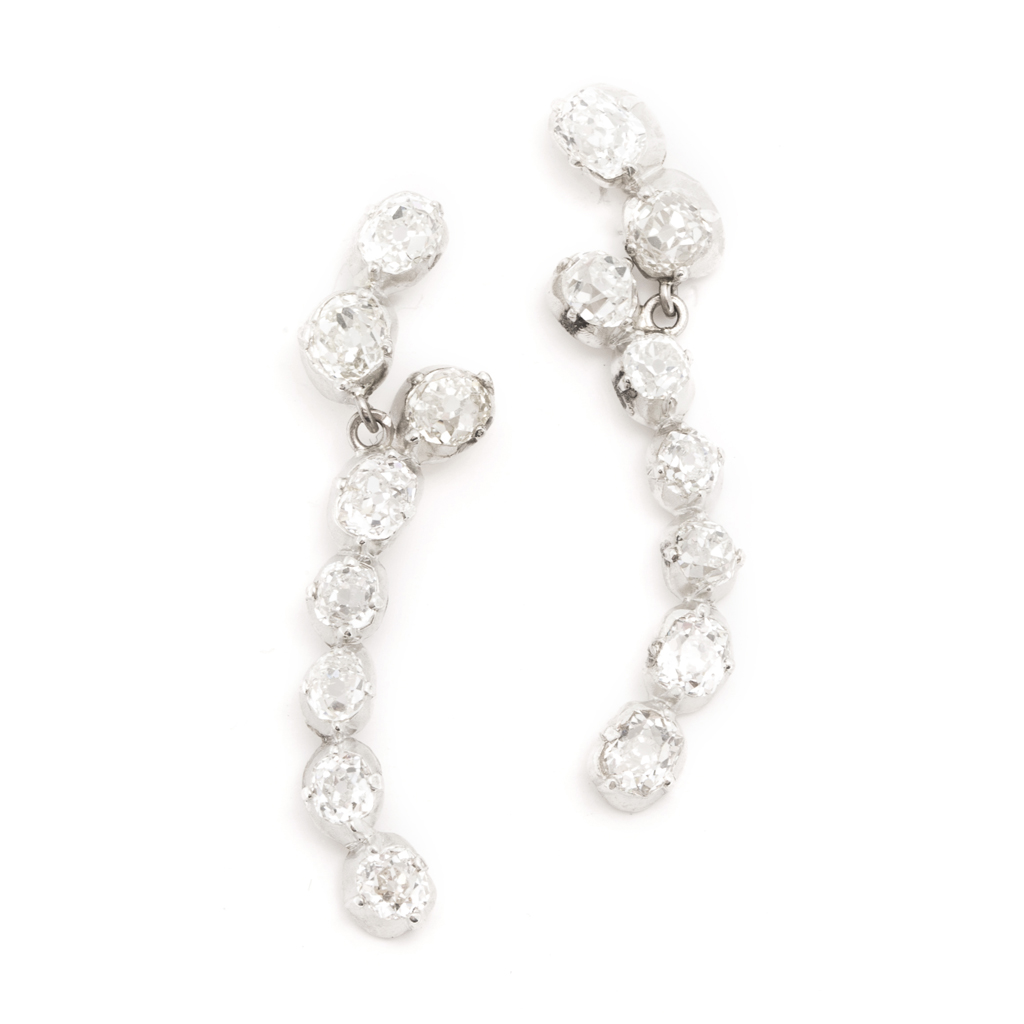 A pair of diamond set pendant earrings