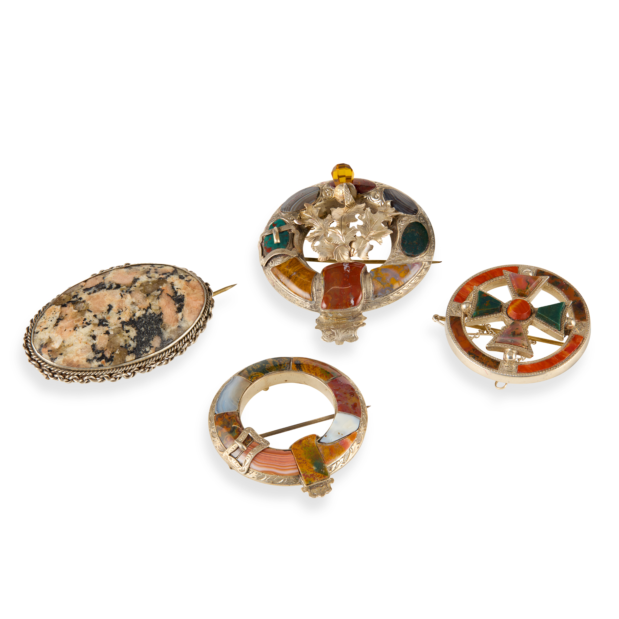 A COLLECTION OF FOUR SCOTTISH HARDSTONE BROOCHES