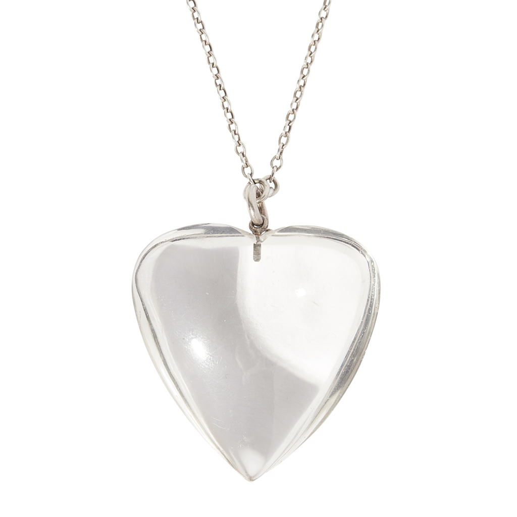 A polished heart shaped rock-crystal pendant