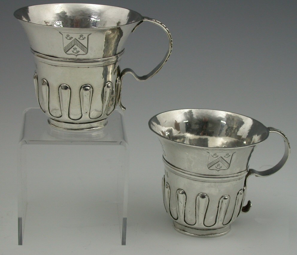 A rare pair of Queen Anne Scottish mugs,