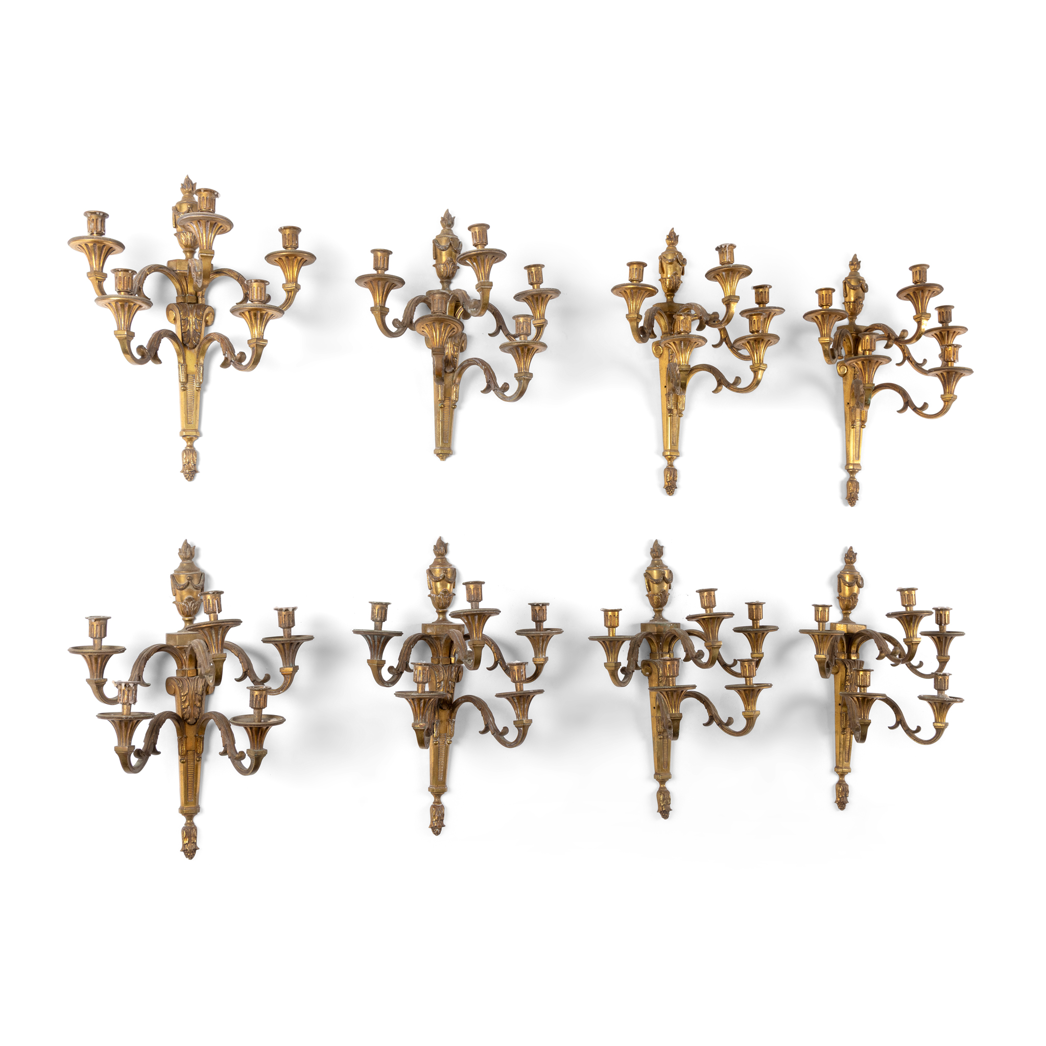 A SET OF EIGHT GILT METAL FIVE BRANCH WALL LIGHTS