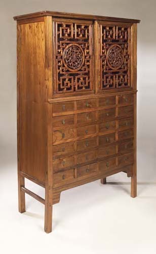 A Chinese hardwood medicine cabinet,