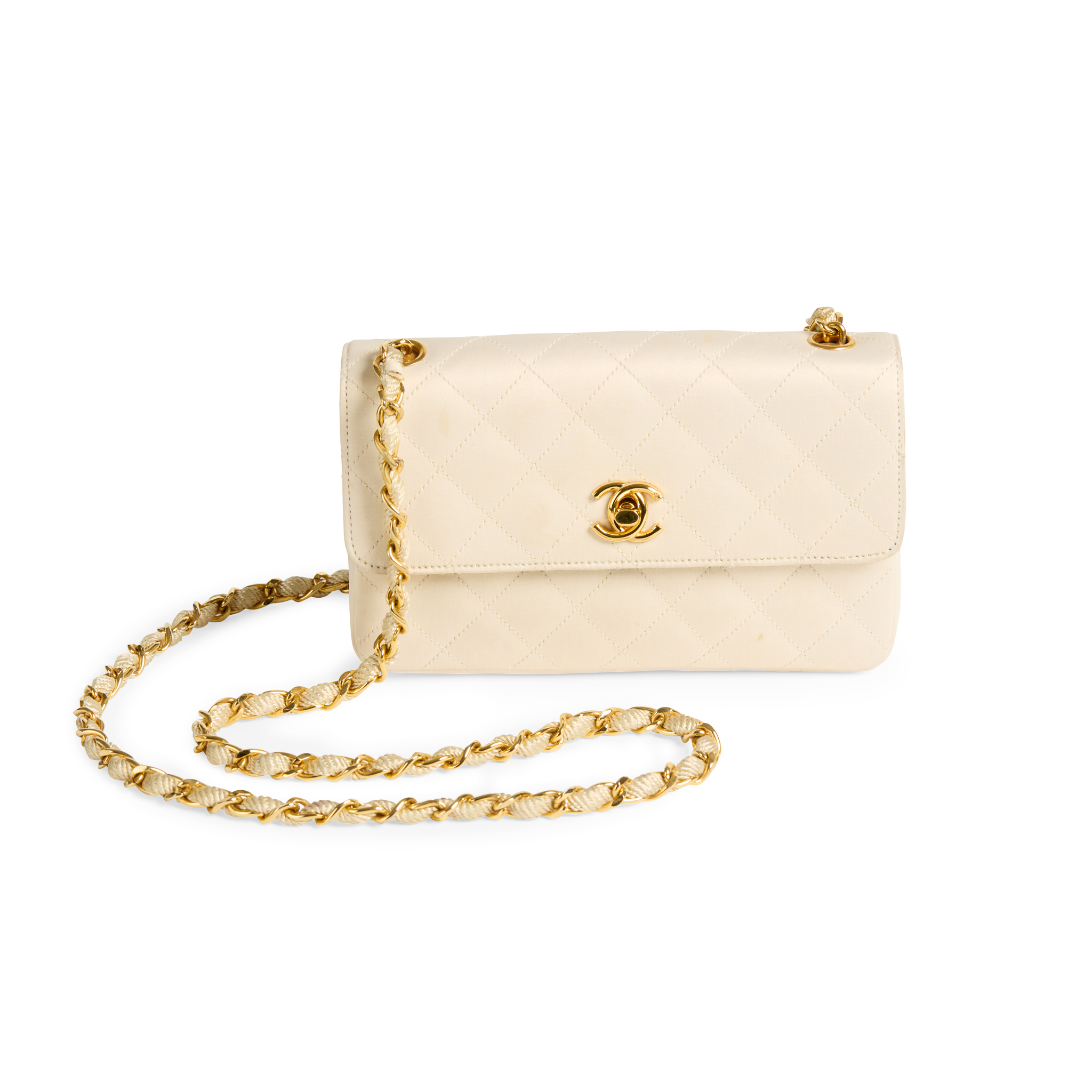 Chanel: A Vintage Cream Quilted Satin Flap Bag