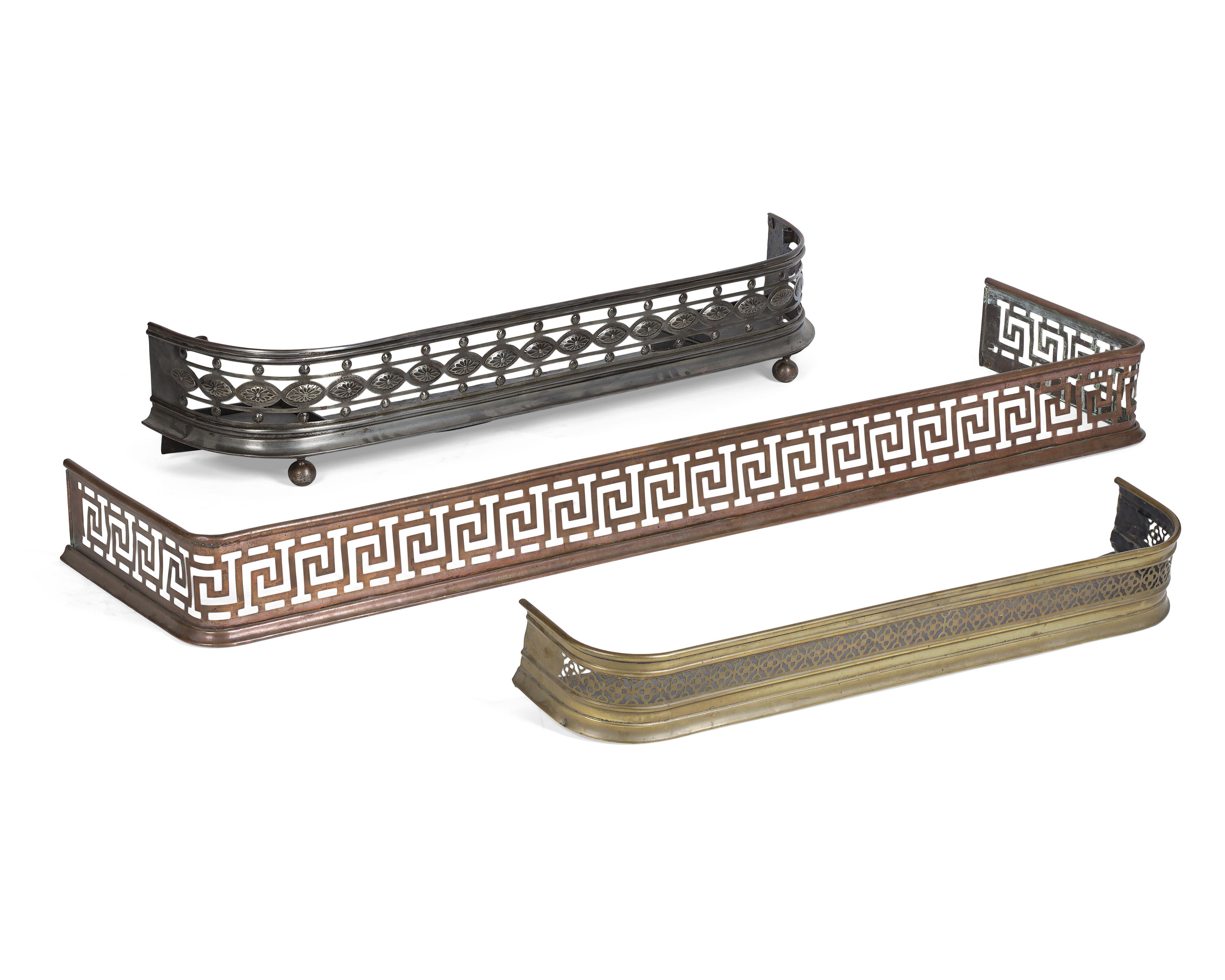 THREE GEORGIAN BRASS, STEEL AND COPPER FENDERS