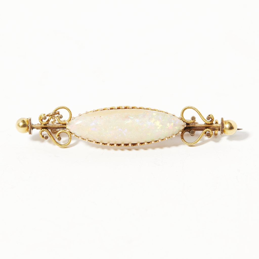 An opal set bar brooch