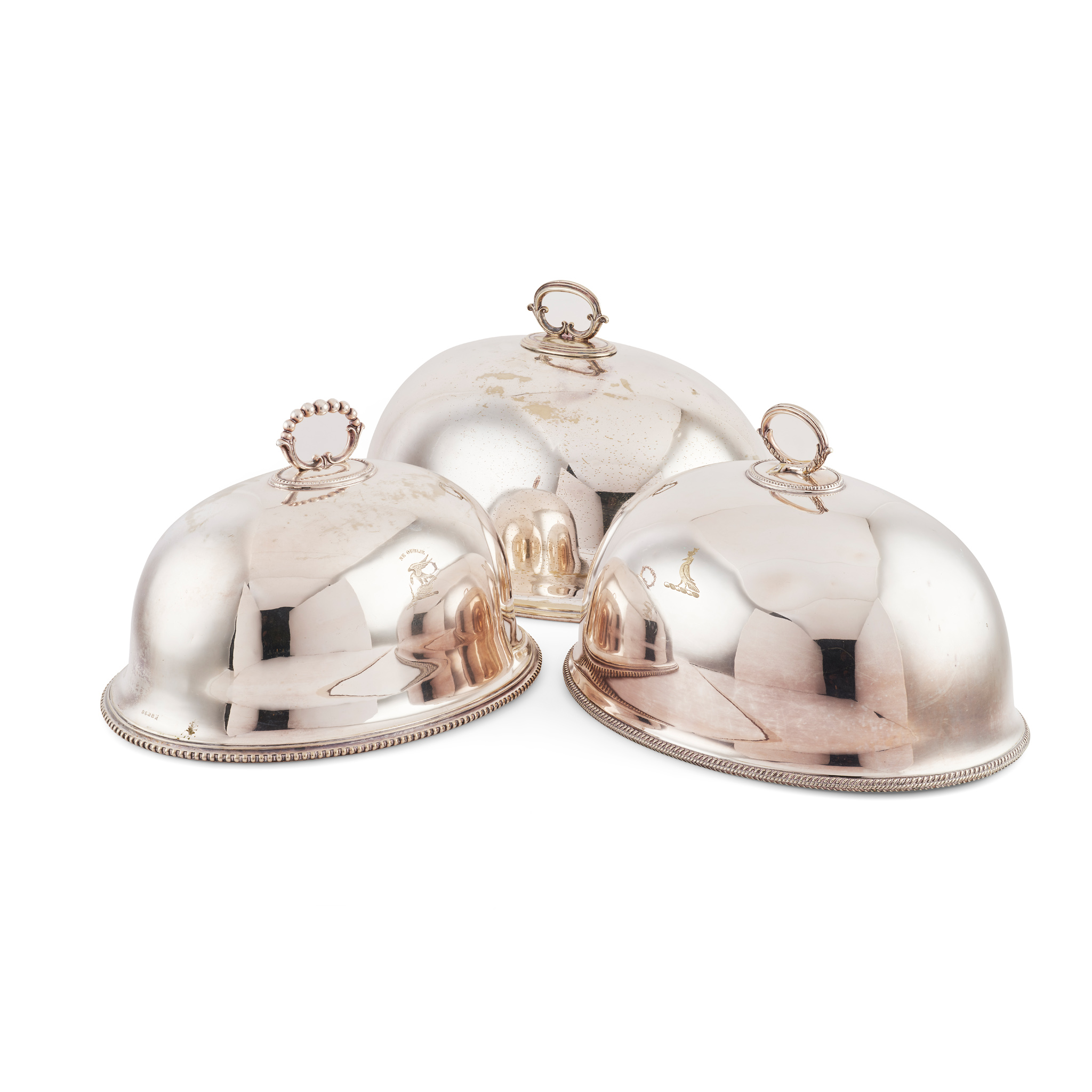 A MATCHED SET OF THREE PLATED DOMED MEAT COVERS