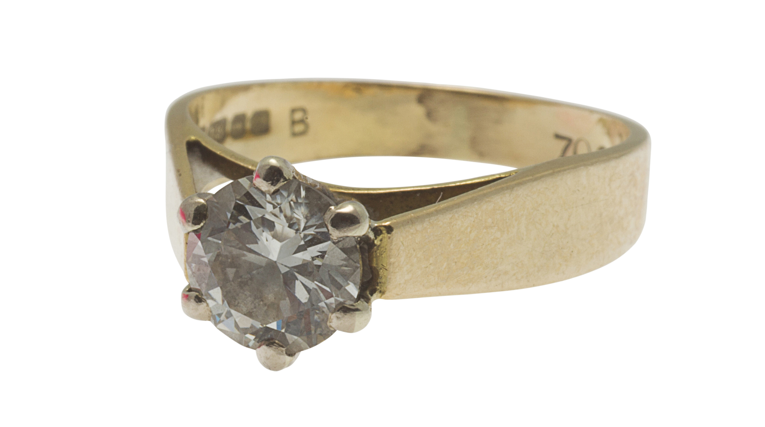 A solitaire diamond set ring