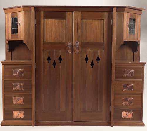 Clarice Cliff interest An Arts and Crafts mahogany wardrobe, designed by Barry Parker and Sir Raymond Unwin,