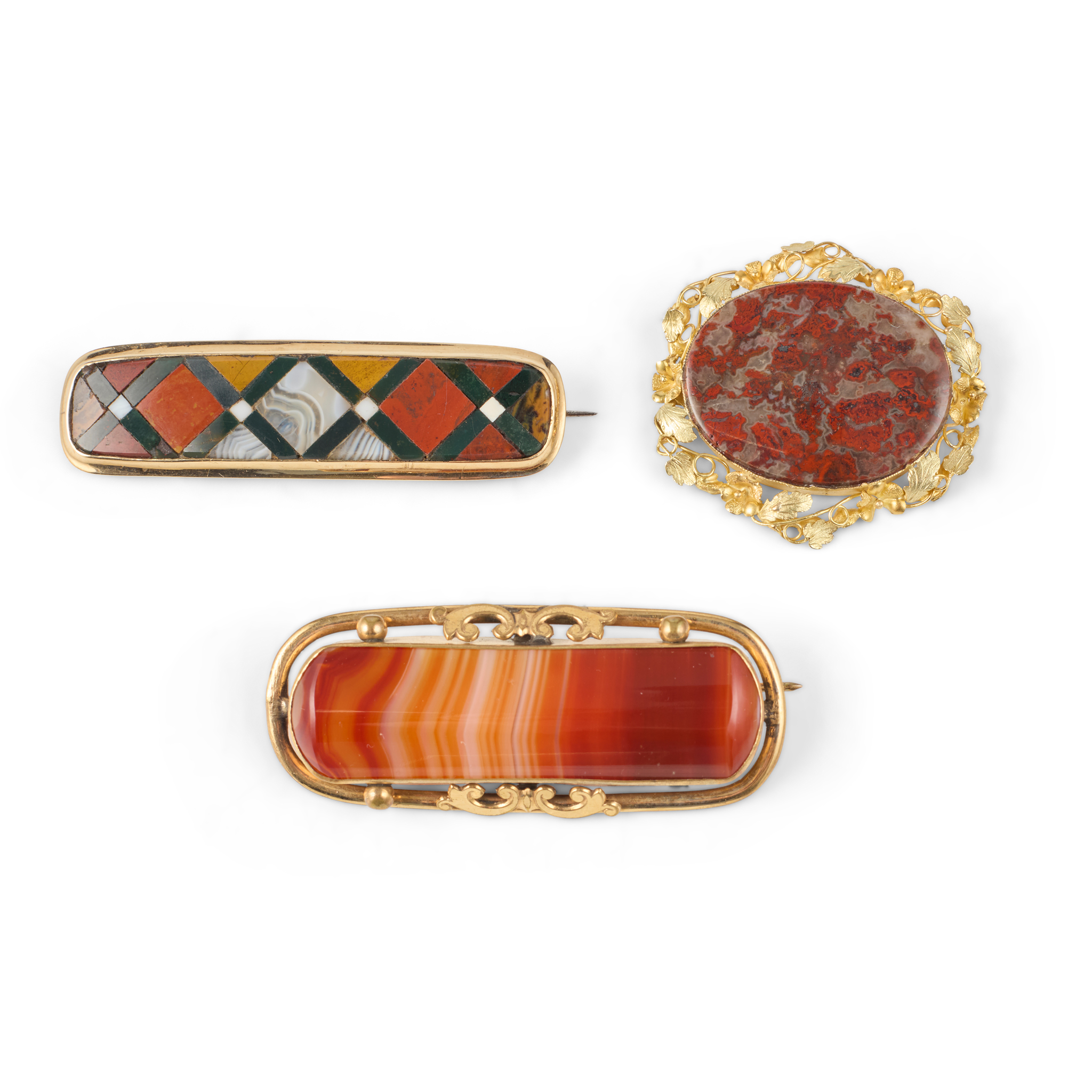 A collection of three Scottish agate brooches