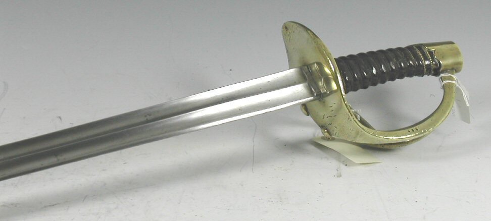 An early 19th century military French Heavy Cavalry sword with brass hilt,