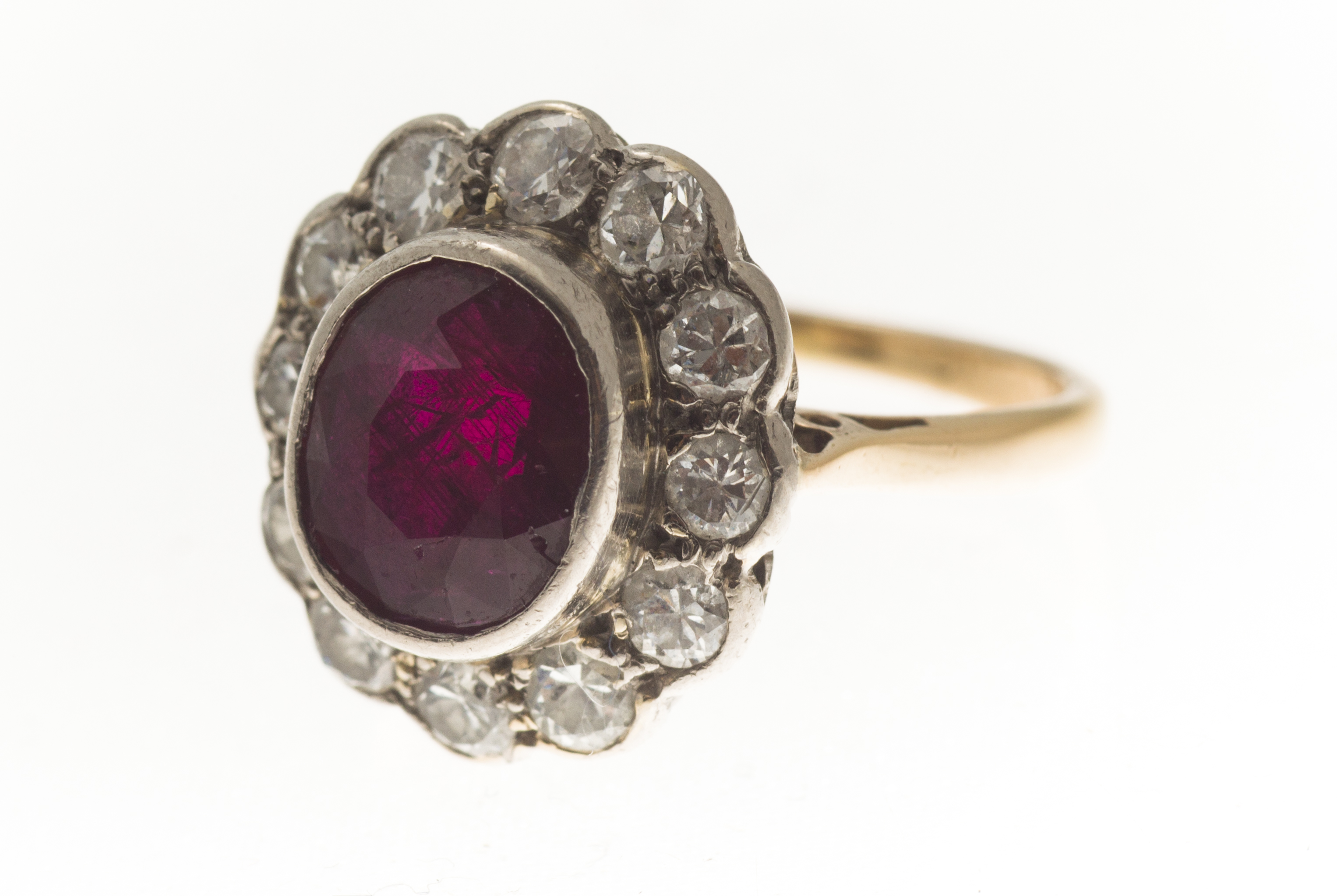 A ruby and diamond set ring