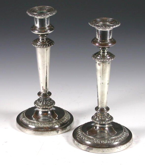 A pair of Old Sheffield plate candlesticks