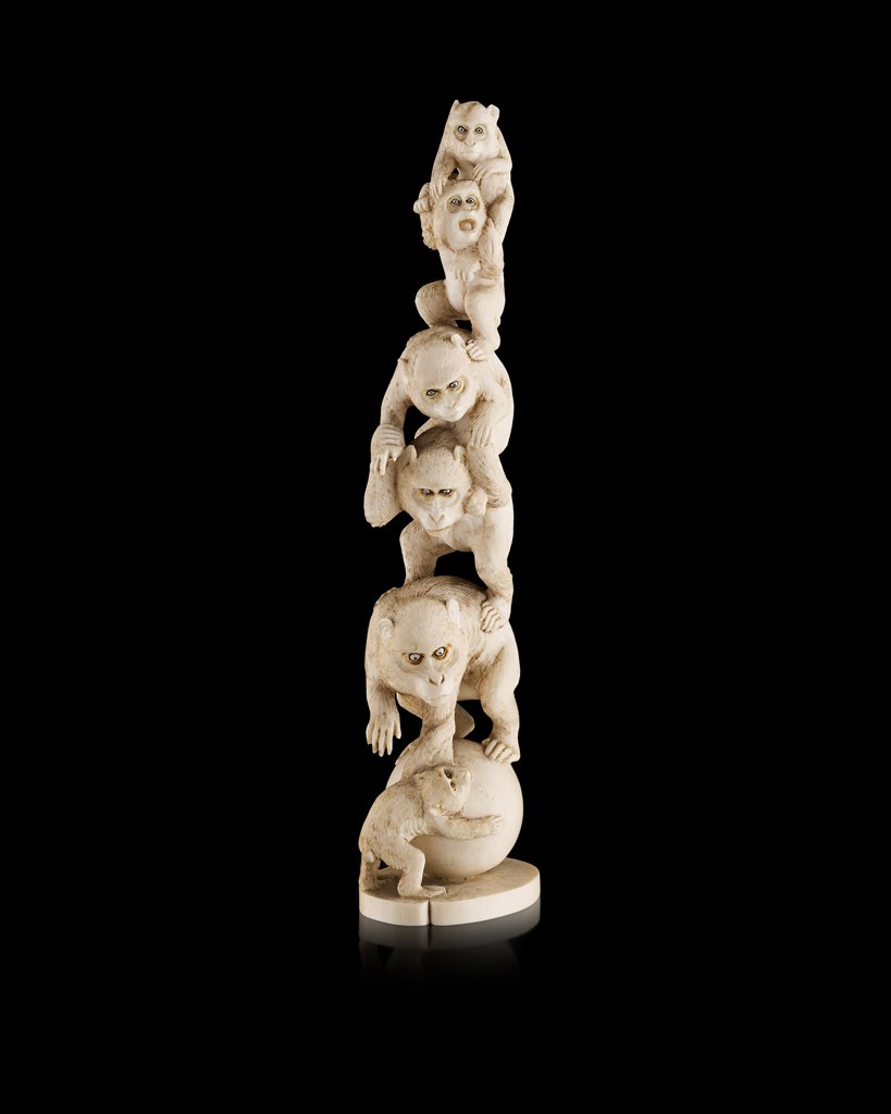 CARVED IVORY OKIMONO OF A MONKEY GROUP