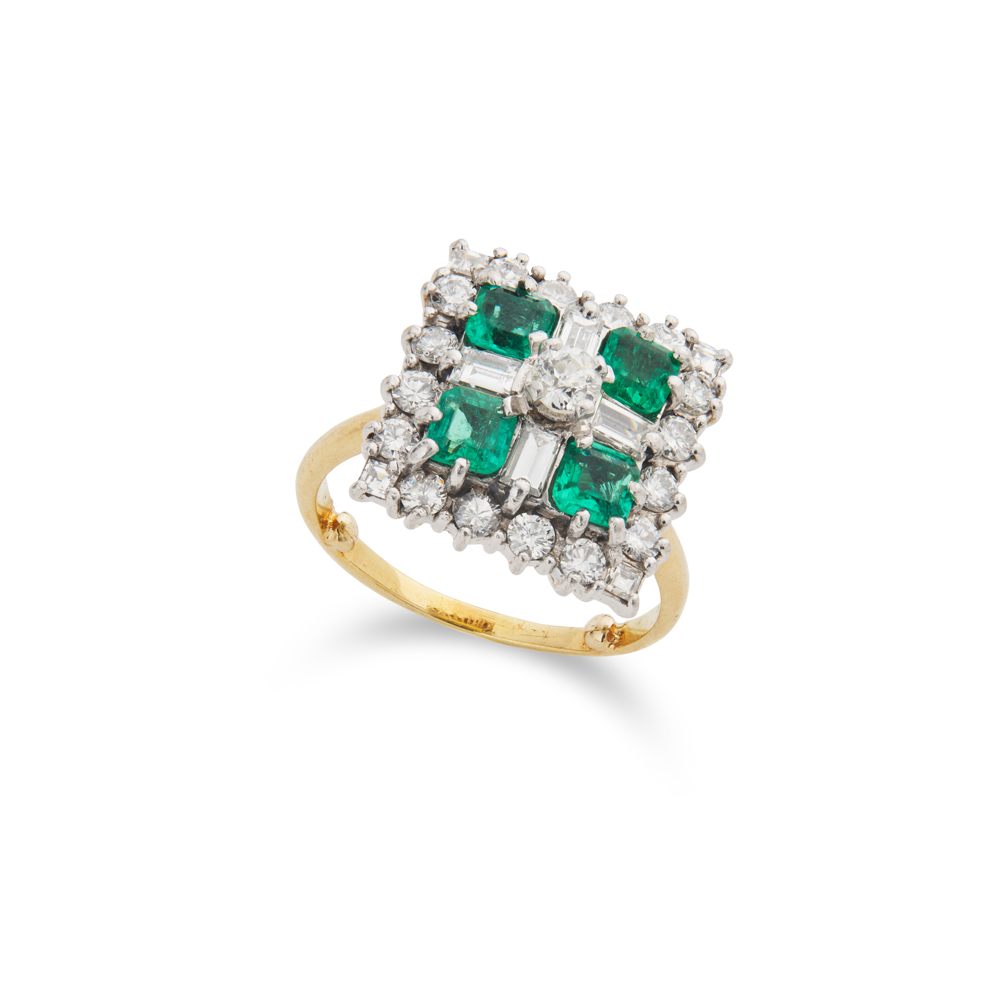 An emerald and diamond dress ring