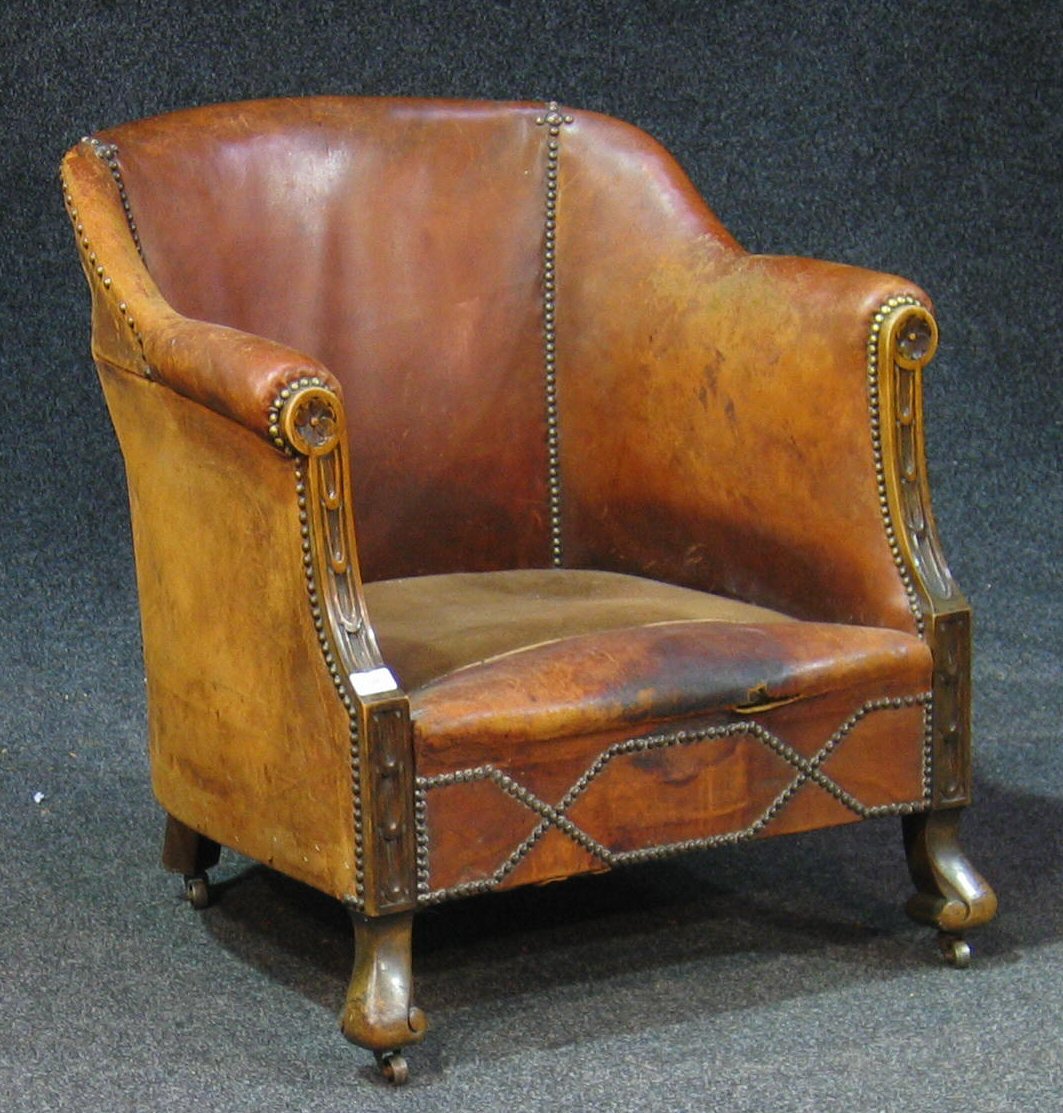An Edwardian tub chair,
