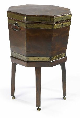 A George III mahogany and brass bound octagonal wine cooler