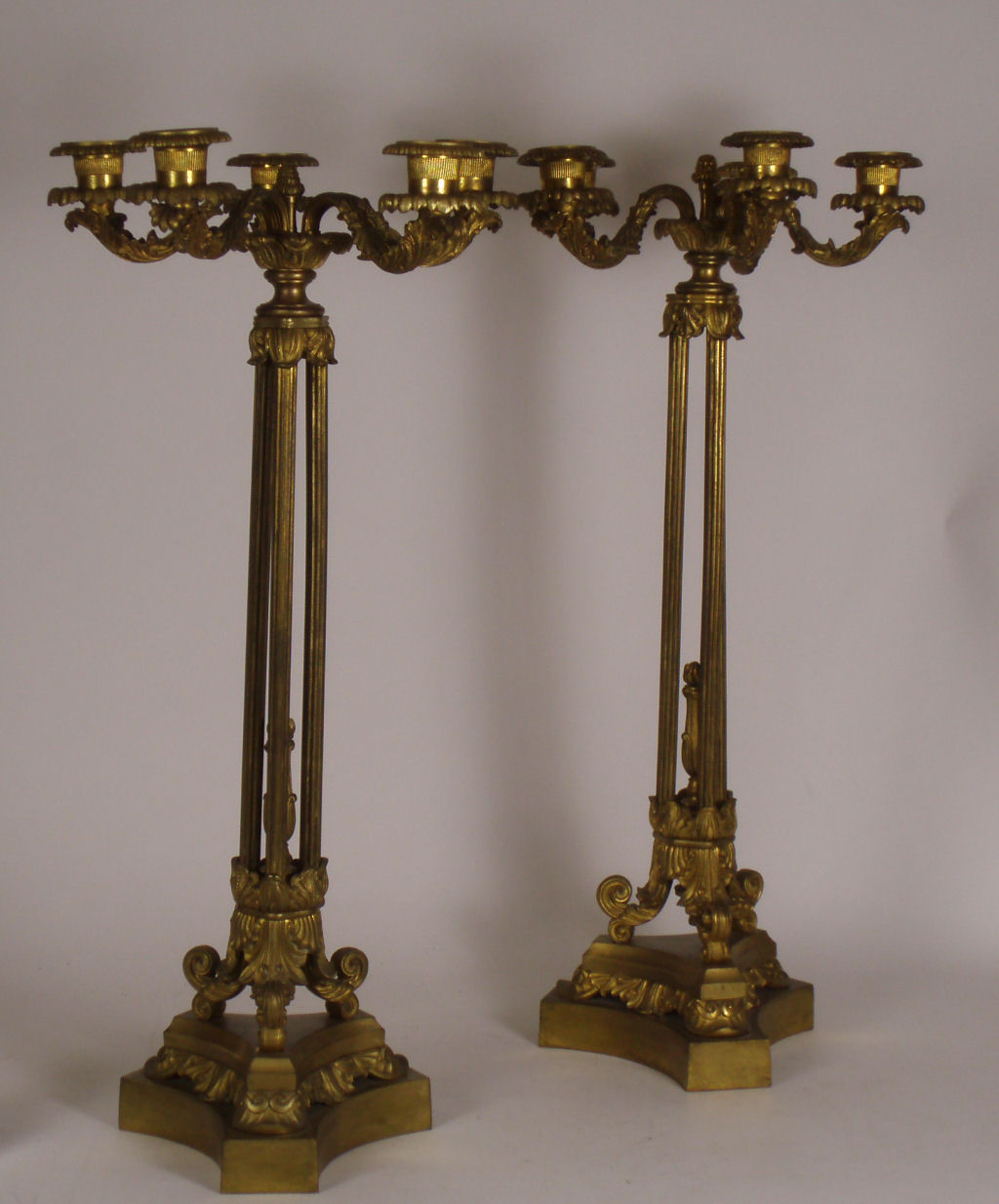 A pair of late 19th century candelabra In the Empire style