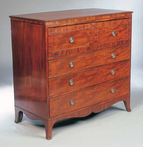 An early 19th century mahogany secretaire chest of drawers