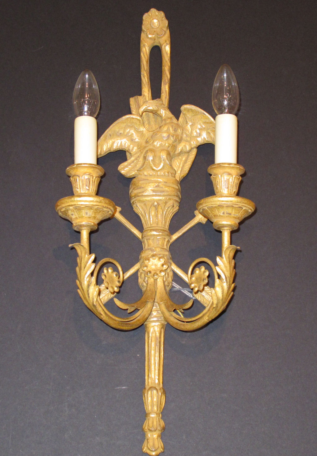 A set of six French Empire style two-branch giltwood wall sconces