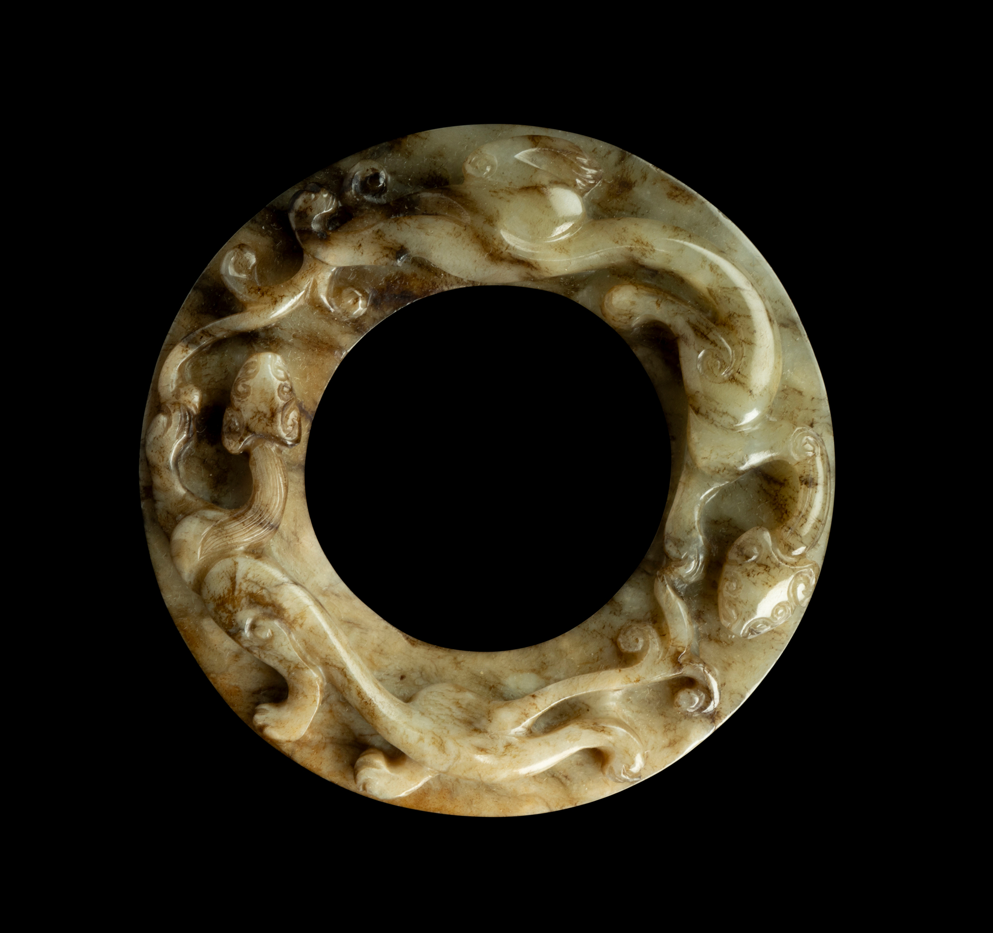 PALE CELADON JADE WITH RUSSET INLUSIONS 'DRAGON' DISC, HUAN