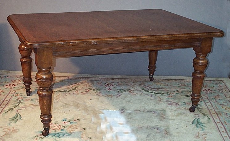 An extending oak dining table