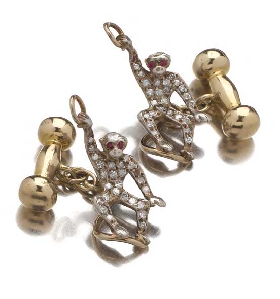 A pair of ruby and diamond set cufflinks,