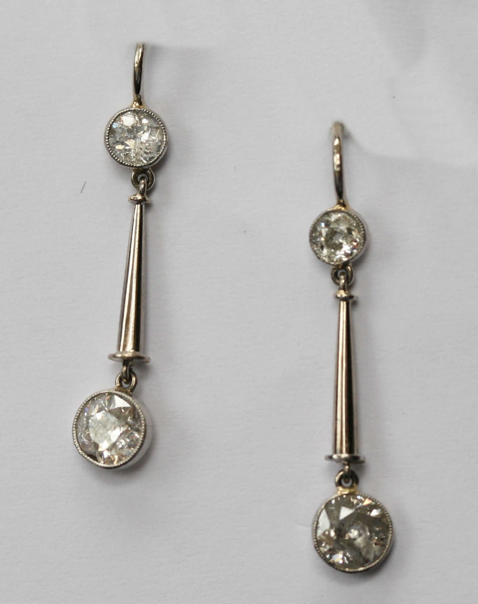 A pair of early 20th century diamond set pendant earrings