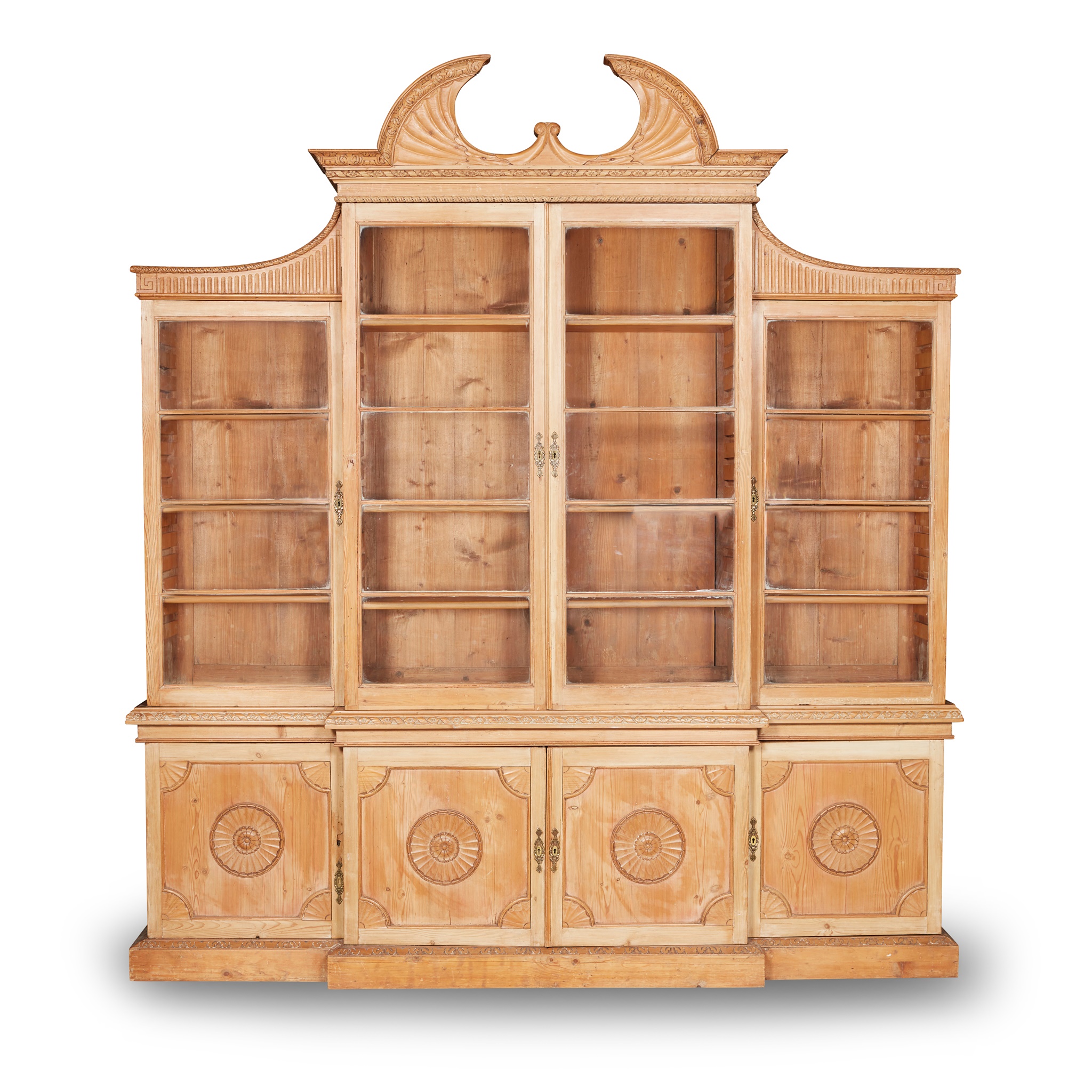 EARLY GEORGE III STRIPPED PINE BREAKFRONT BOOKCASE