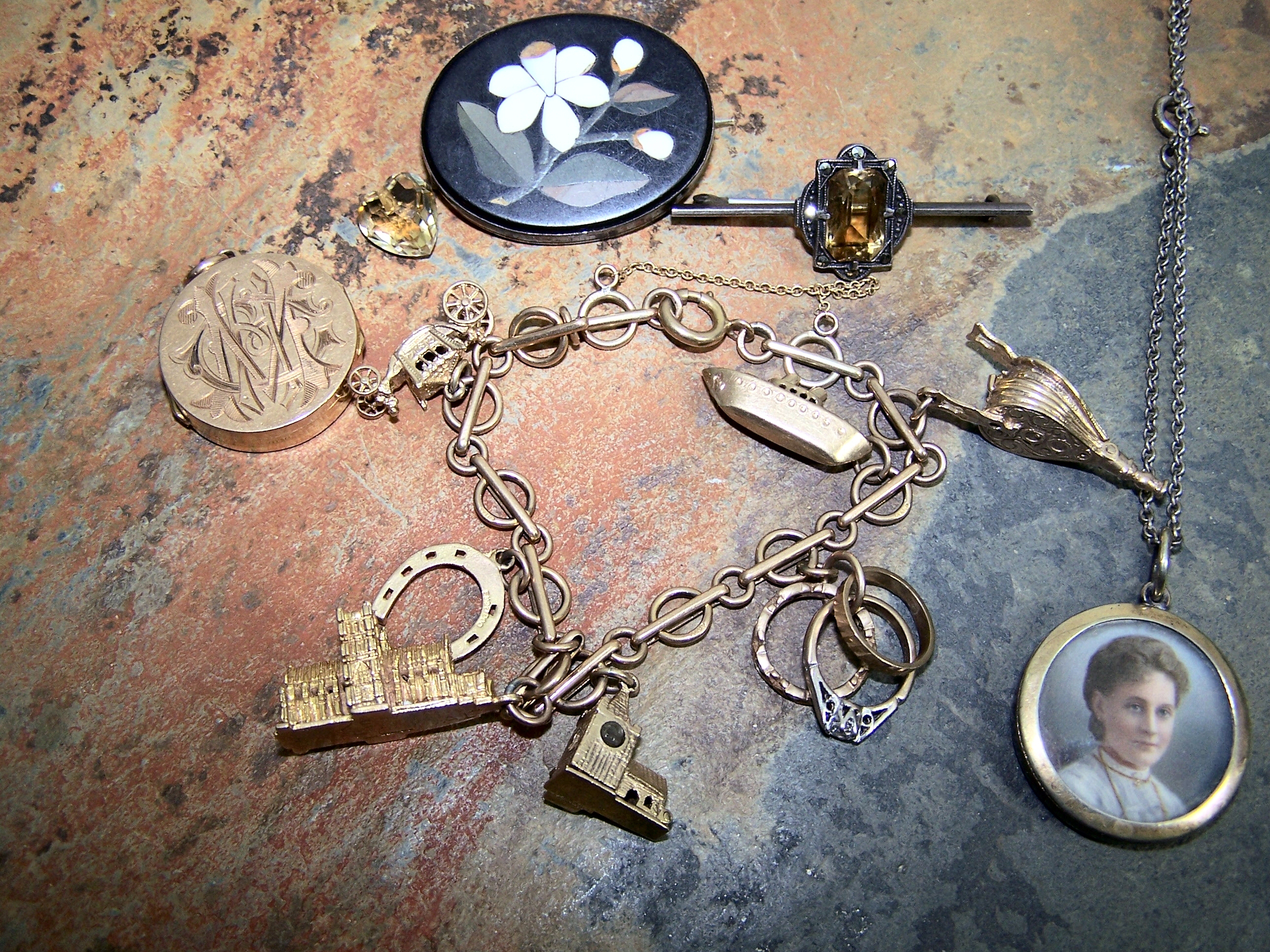 A 9ct gold fancy circular link charm bracelet,