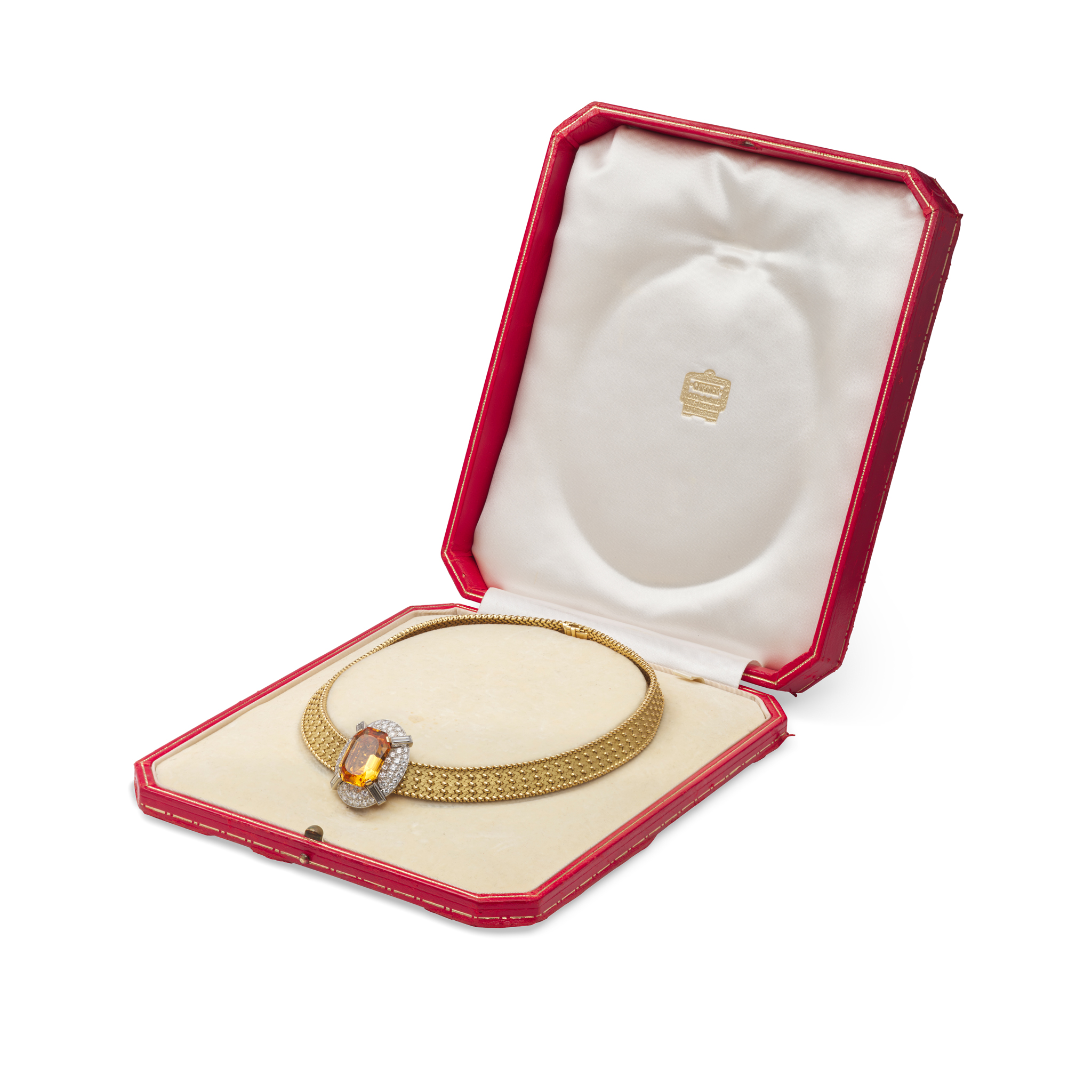 Cartier: A gold necklace by Georges Lenfant with a detachable Imperial topaz and diamond cluster