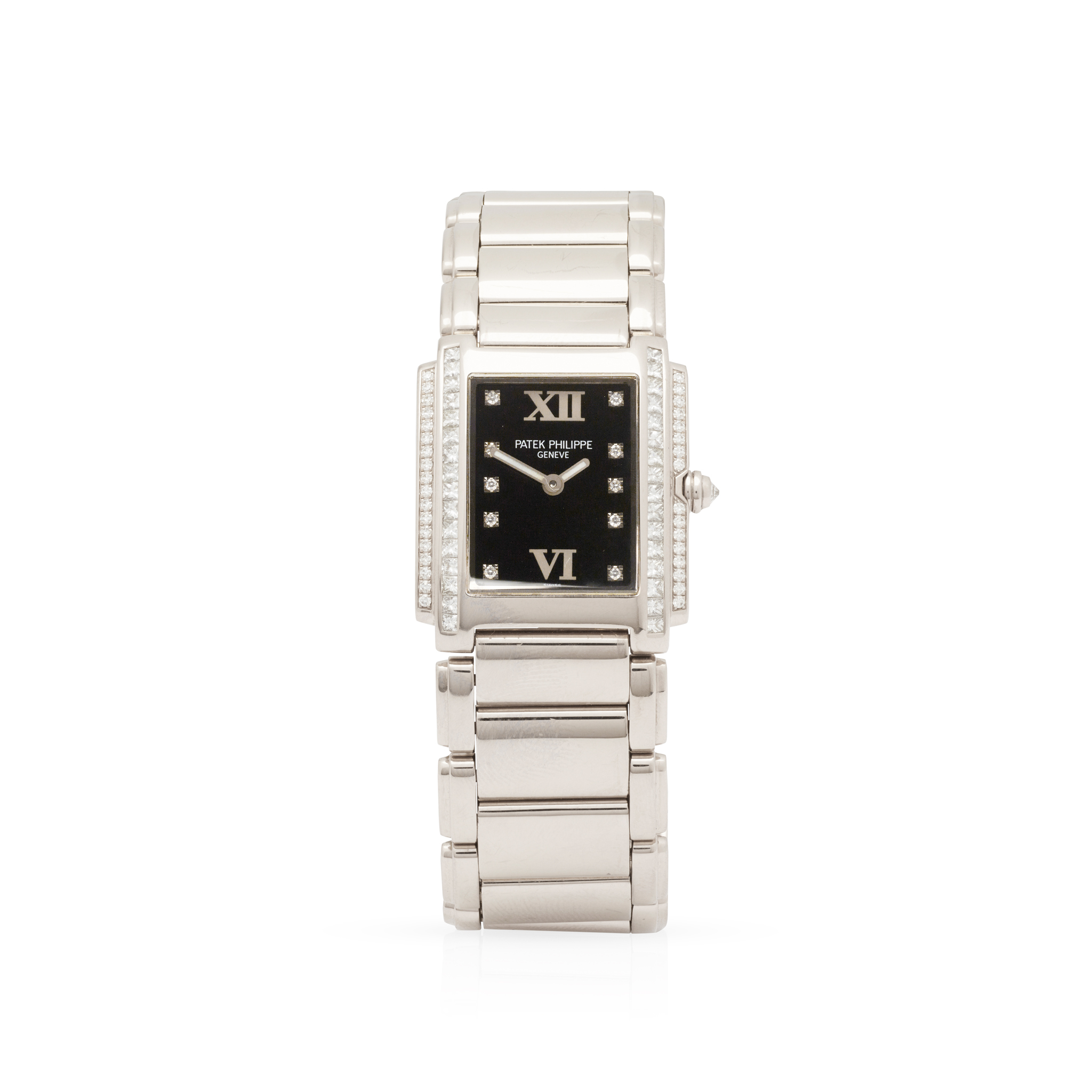 Patek Philippe. A Ladies very fine and attractive 18k white gold and diamond-set quartz bracelet watch,