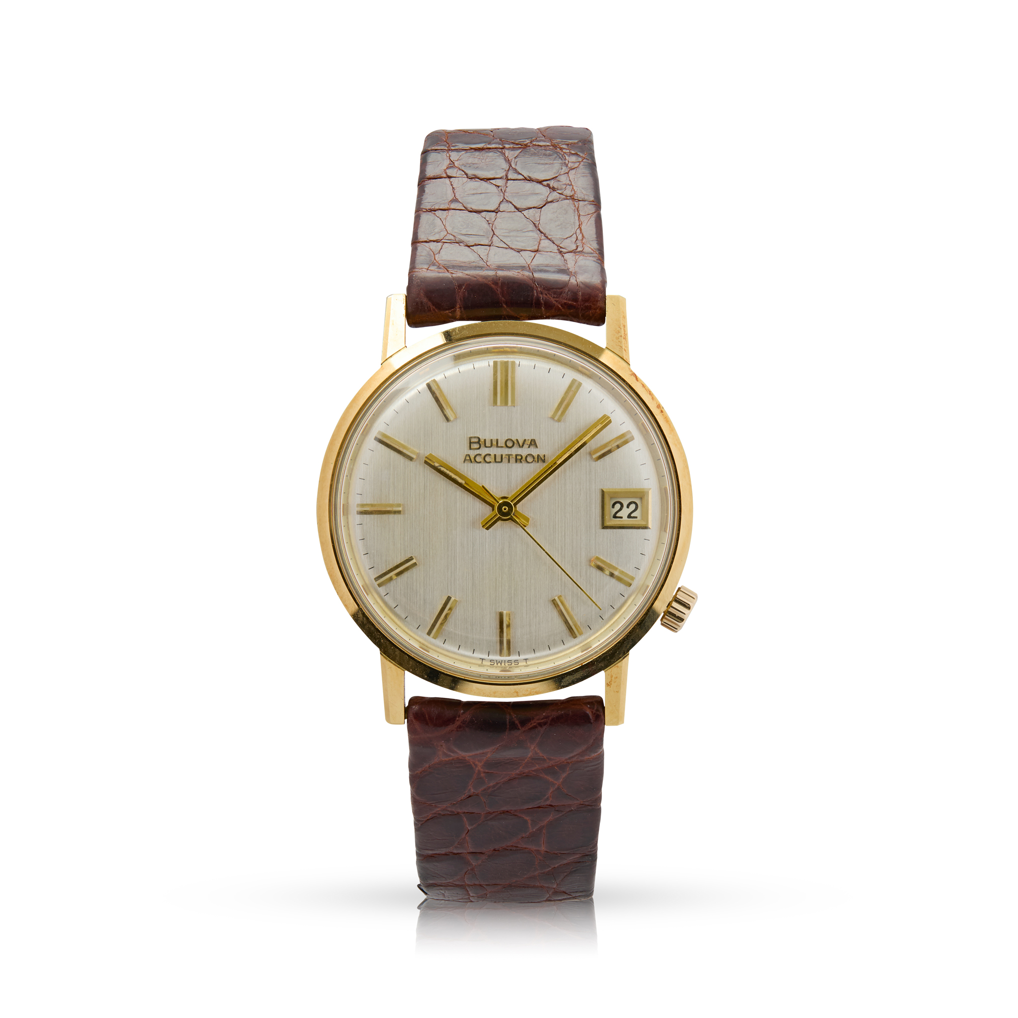 Bulova. An 18k gold electronic wristwatch with date