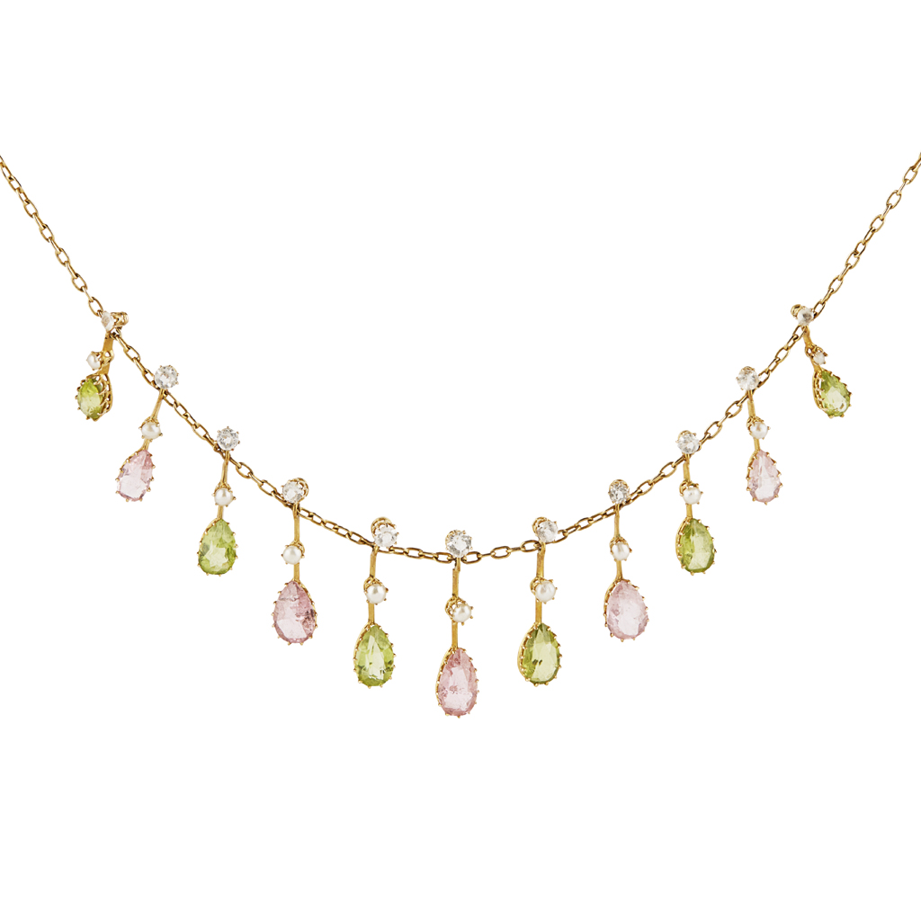 An Edwardian peridot and tourmaline set fringe necklace