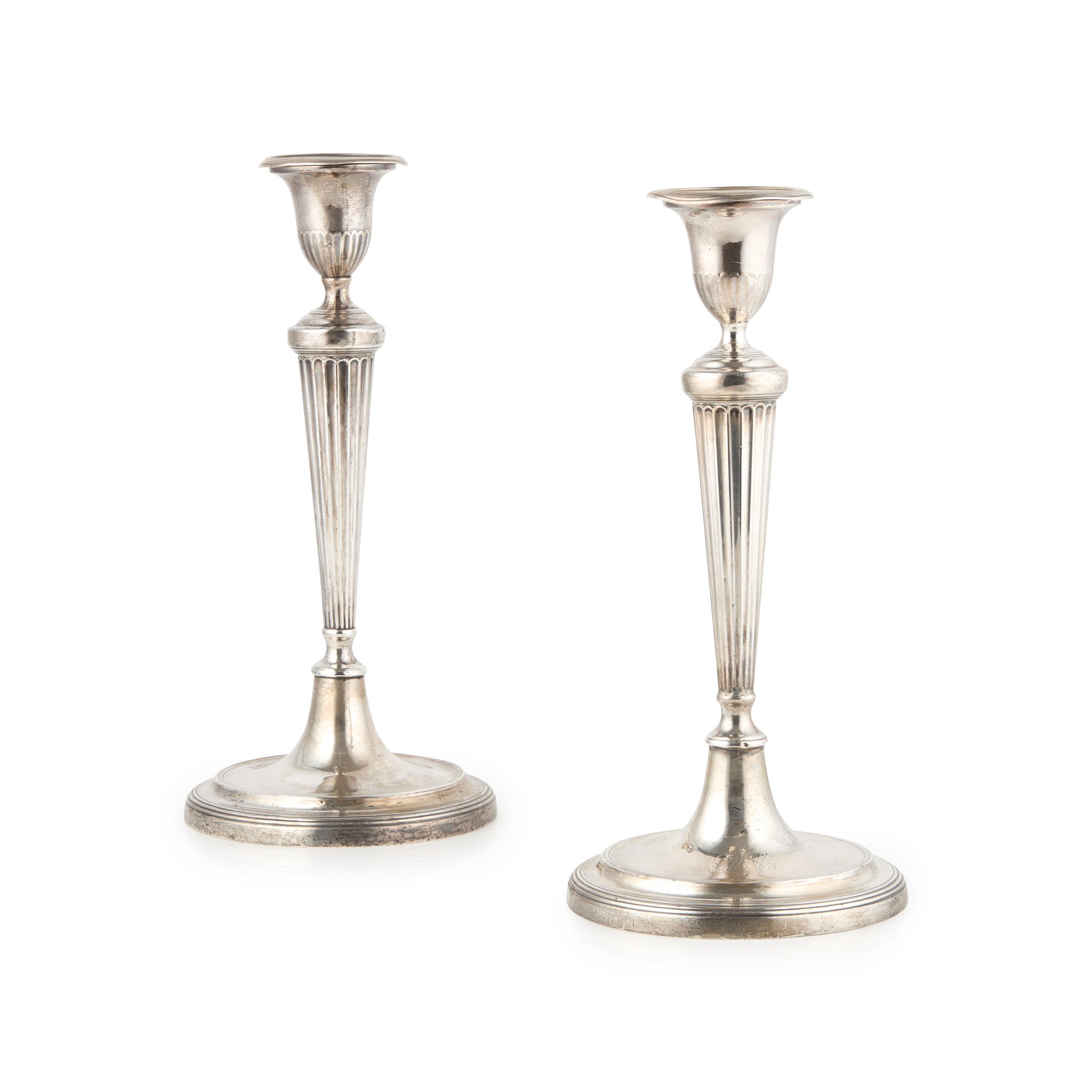 A PAIR OF GEORGE III CANDLESTICKS