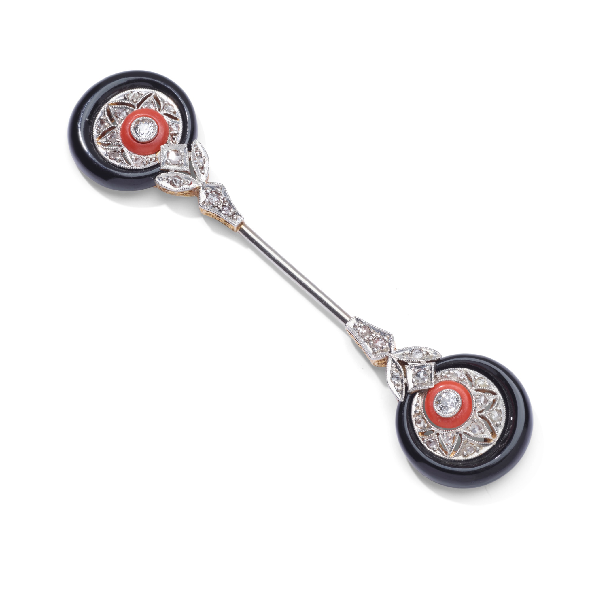 An early 20th century coral and onyx jabot pin