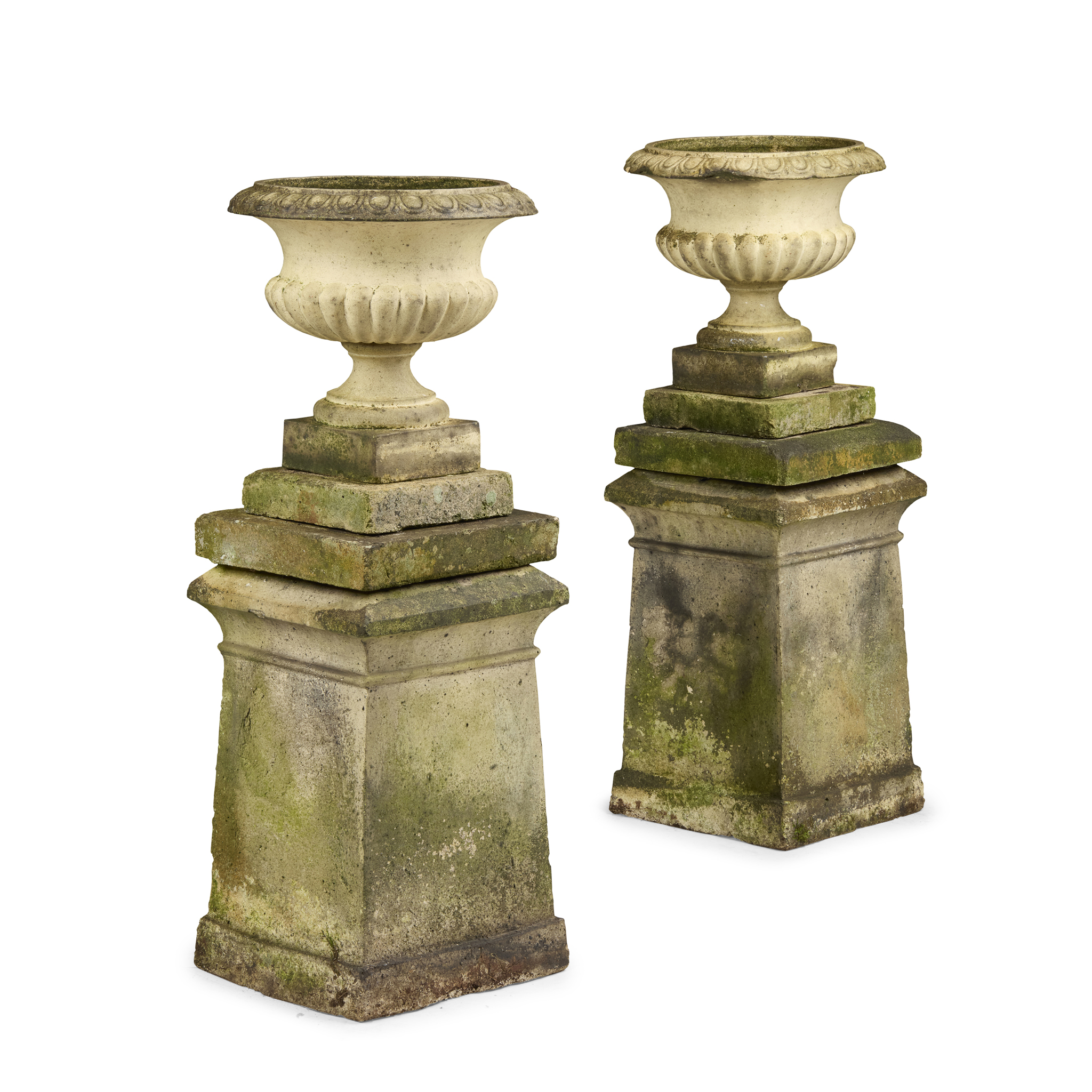 PAIR OF FIRECLAY URNS ON STANDS