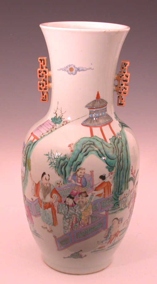 A pair of Canton twin handled famille rose baluster vases,