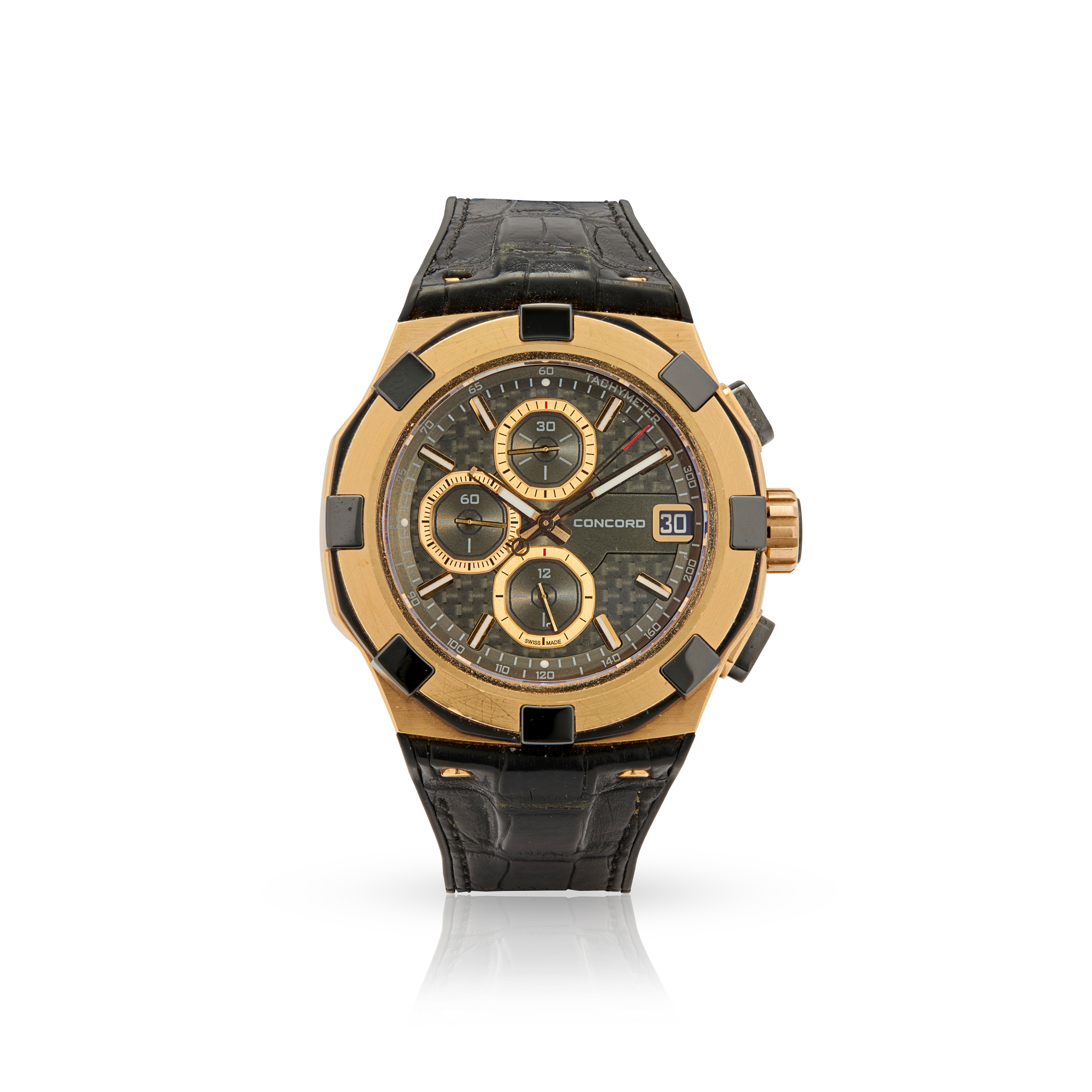 Concord. A large 18k rose gold and black titanium automatic chronograph wristwatch