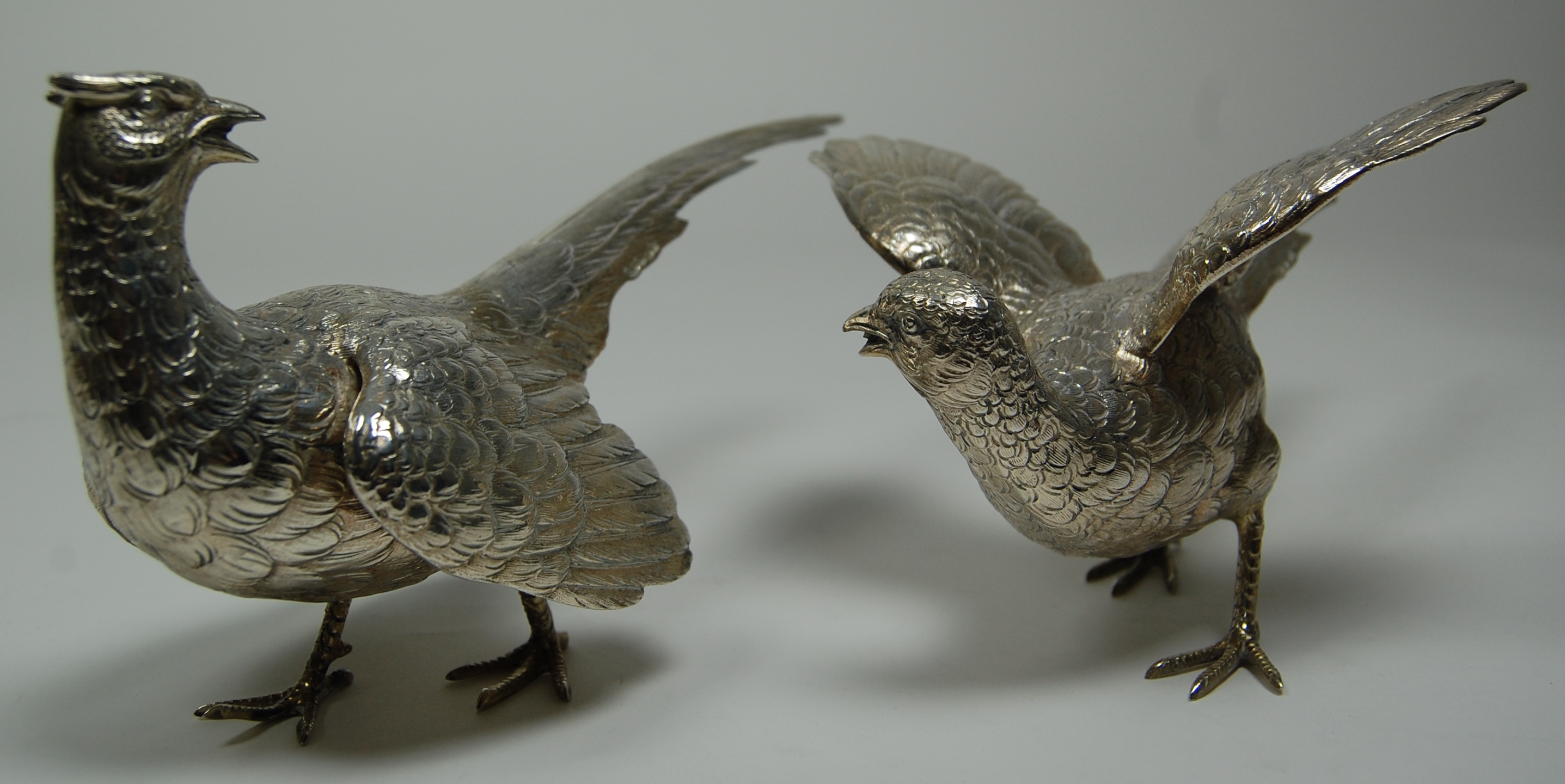 A pair of modern pheasant table ornaments