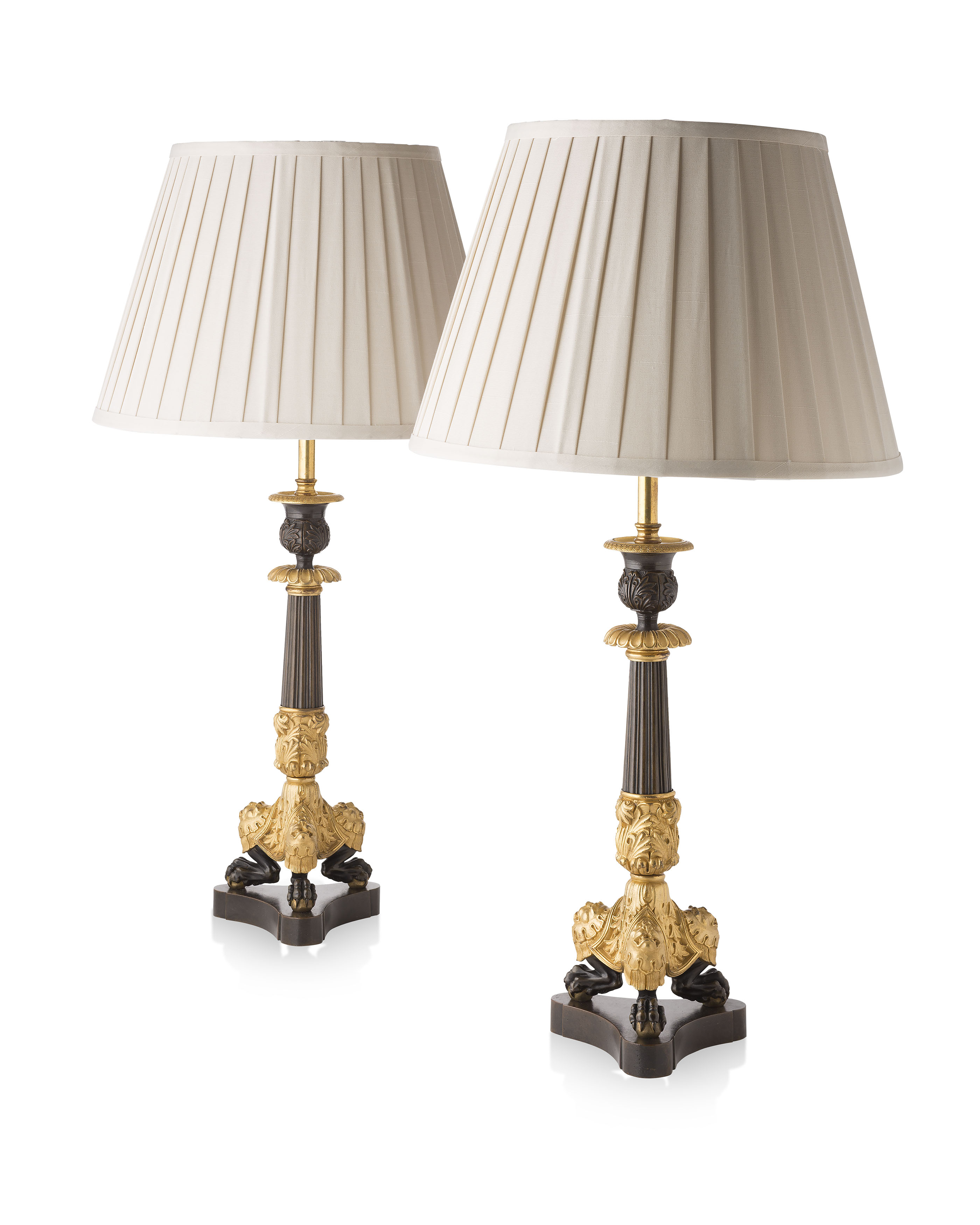 PAIR OF REGENCY PATINATED AND GILT BRONZE LAMPS