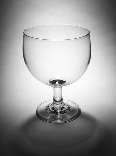 A plain large early 19th century footed punch bowl,