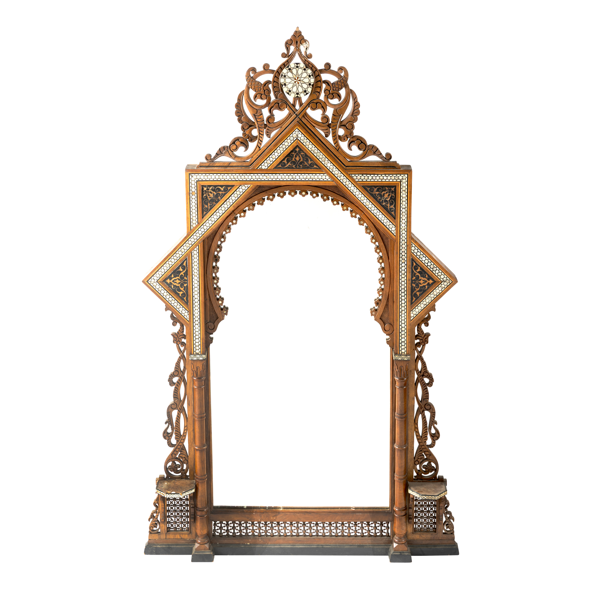 AN OTTOMAN INSPIRED WALNUT, MOTHER OF PEARL AND BONE INLAID EBONISED WALL MIRROR
