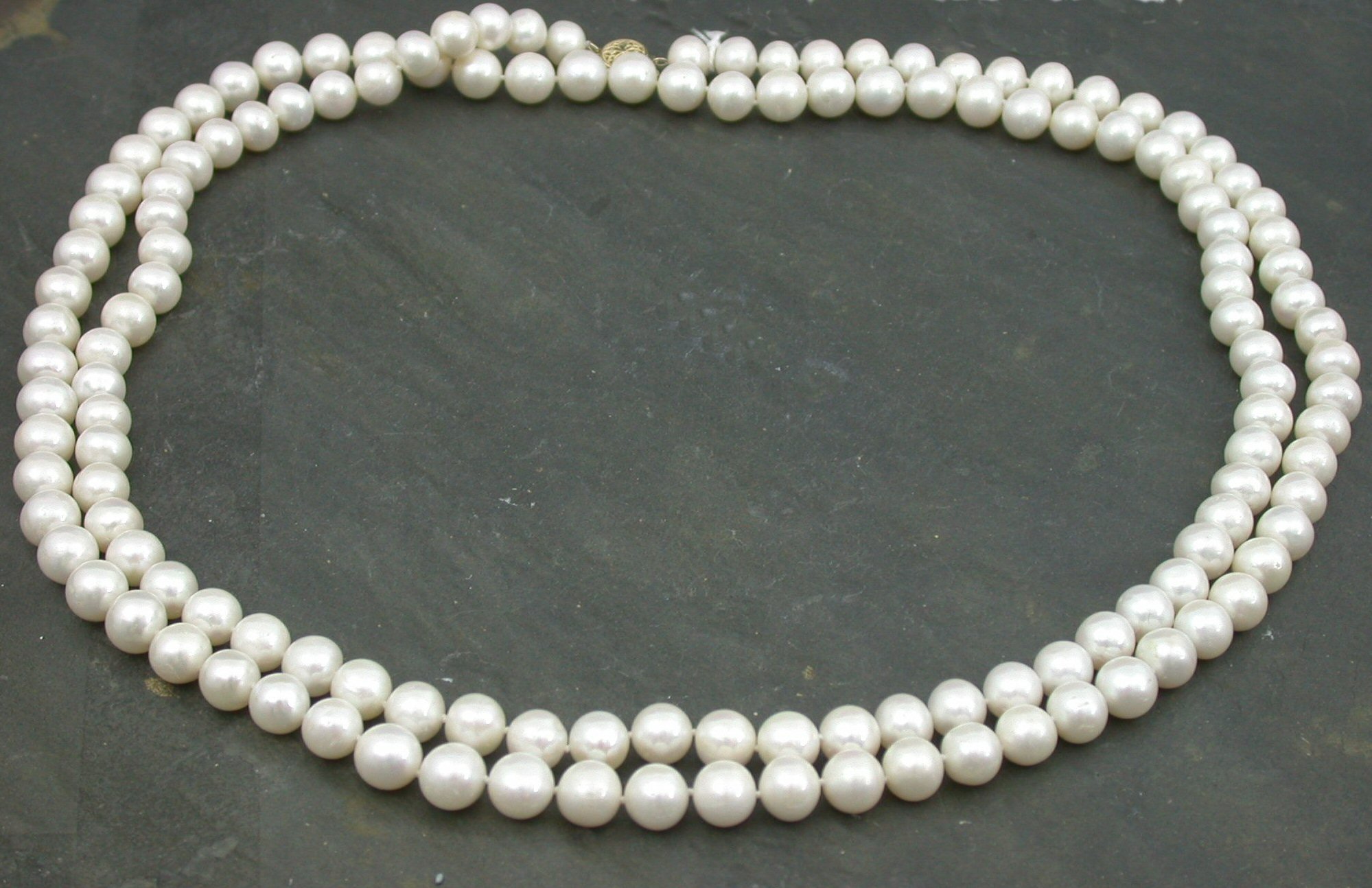 A rope length freshwater cultured pearl necklace,