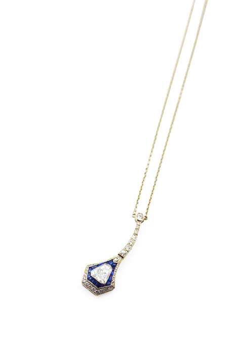 An early 20th century sapphire and diamond set necklace