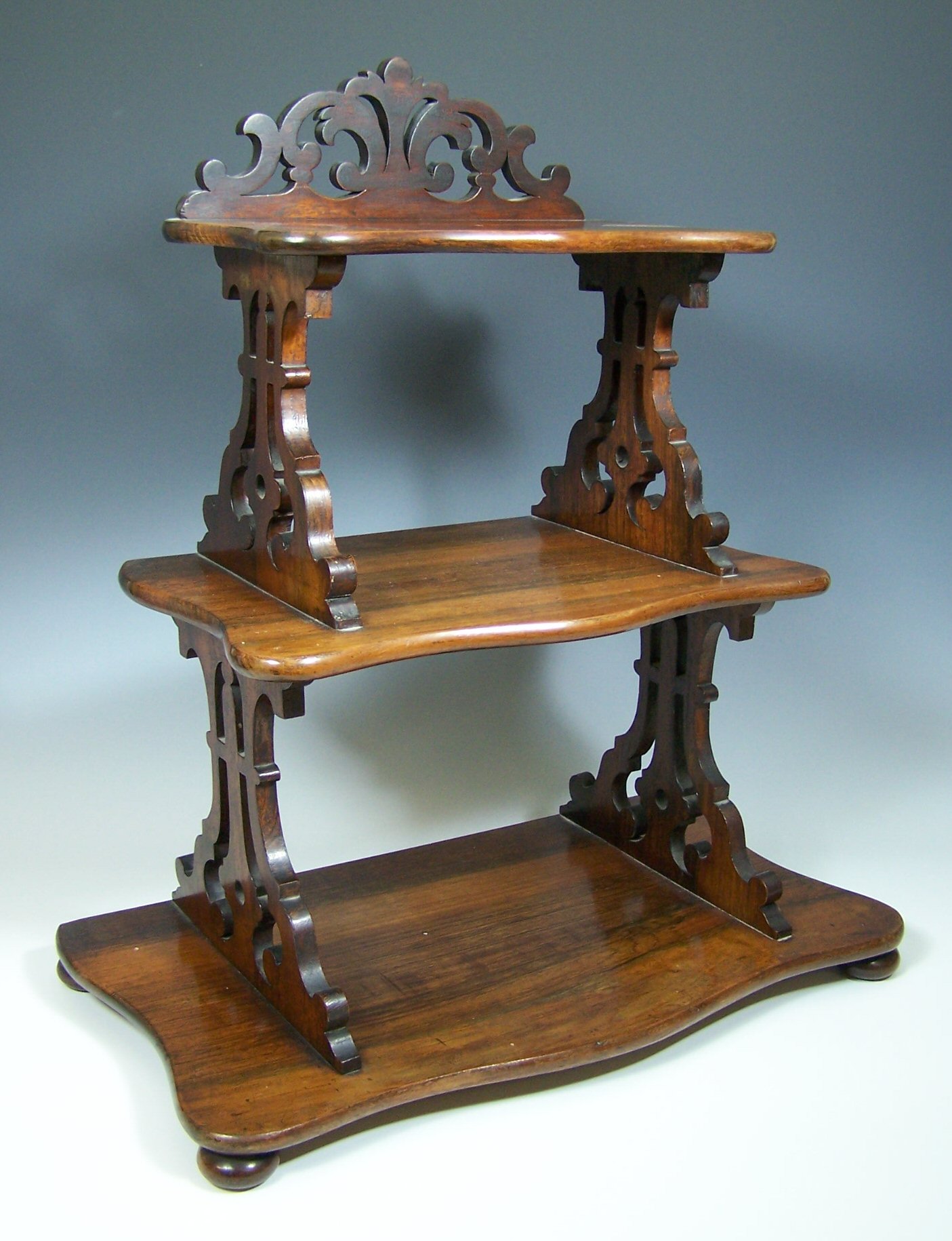 A miniature Victorian rosewood whatnot,