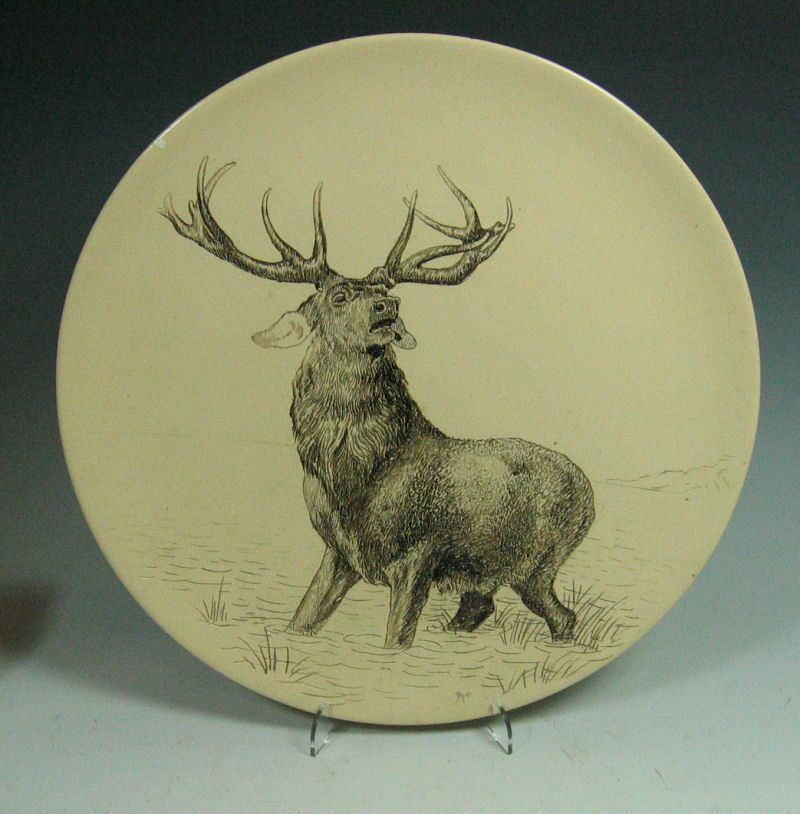 A 19th century Royal Worcester sgraffito charger by Albert Binns