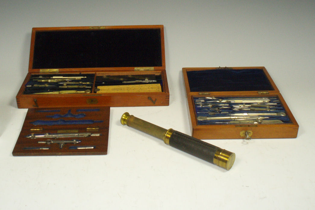 An early 20th century mahogany fitted cased set of drawing instruments